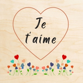 Carte en bois fleurie imprimée du message je t'aime.